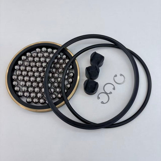4 in FlowValve-style swivel joint repair-kit rings, balls and retaining hardware arranged on a white background.
