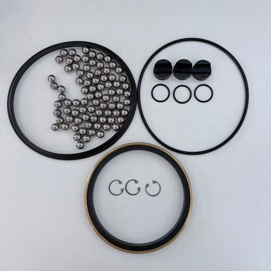 4 in Kemper-style swivel joint repair-kit seals, balls and retaining hardware arranged on a white background.