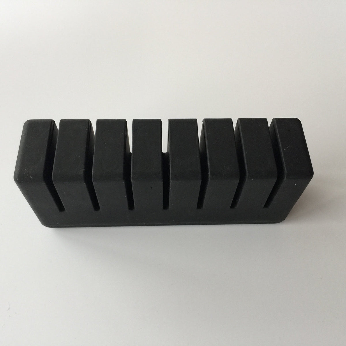 Slotted rubber spacer profile