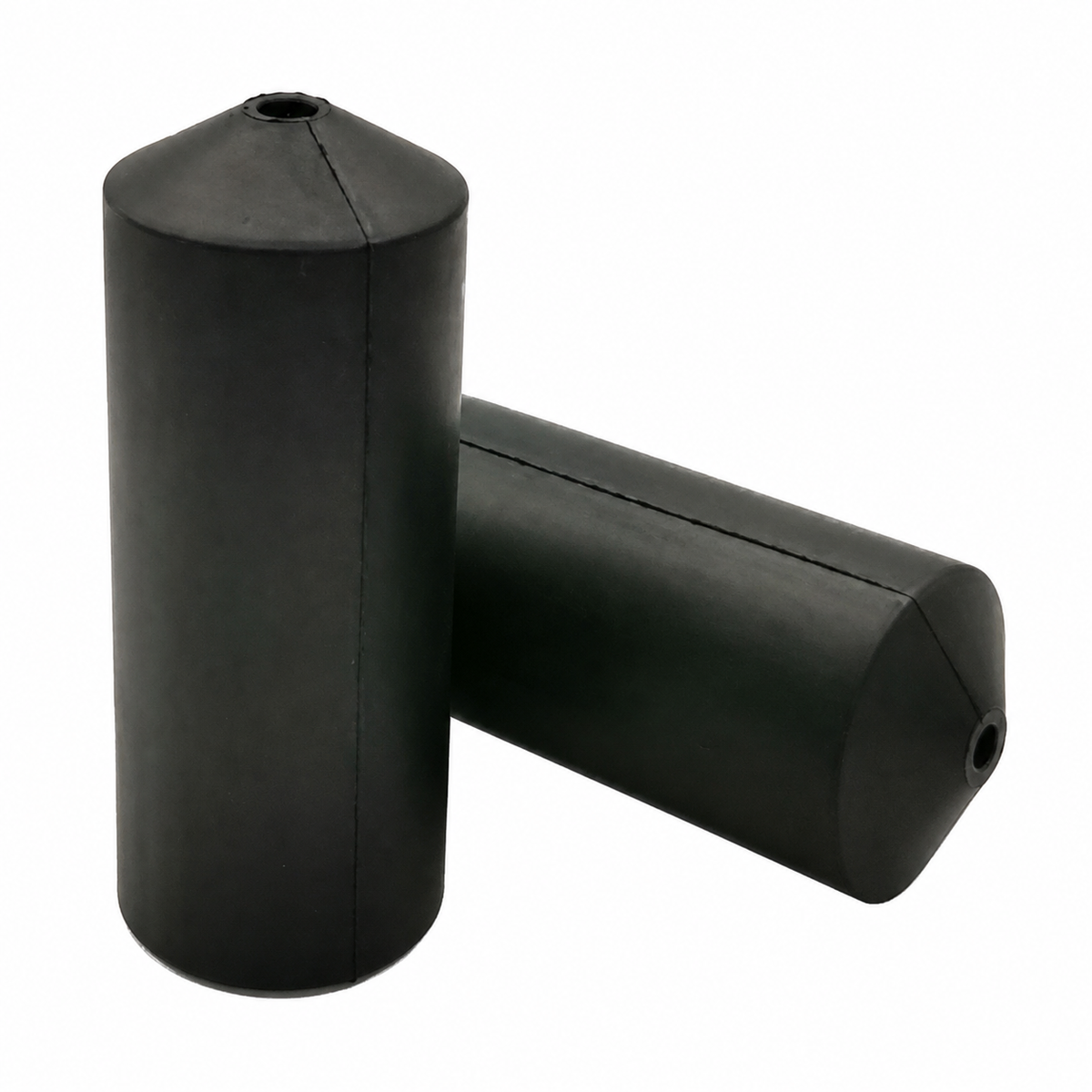 OS-9S Solid Oil Saver Rubber showing two black cylindrical rubber pieces with circular openings and center seams
