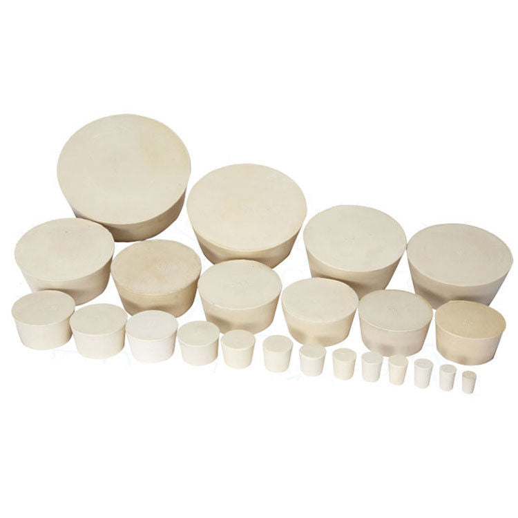Assortment of solid conical rubber stoppers arranged by visible size