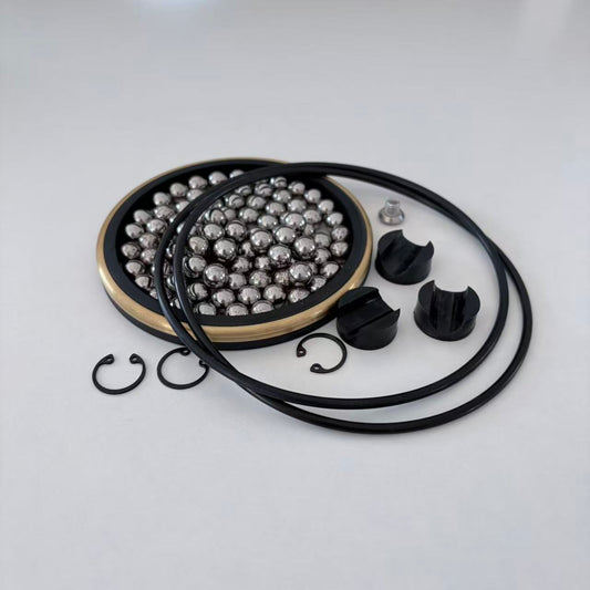4 in TSI-style swivel joint repair-kit rings, balls and retaining hardware arranged on a white background.