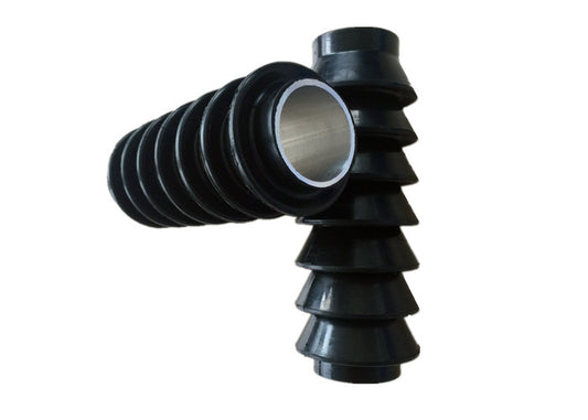 Two black 2 in light-to-medium load multi-lip swab cups on a white background