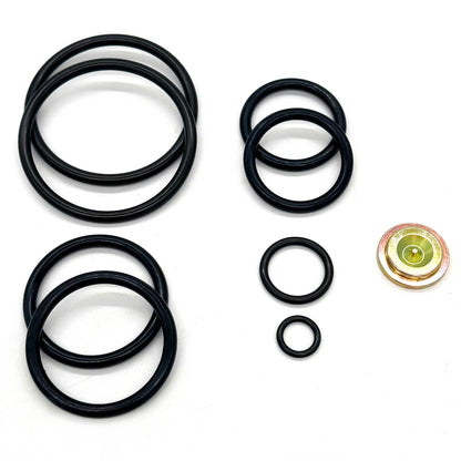Baker Style #20 short-stroke redress-kit components arranged on a light background.