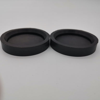 Molded rubber cup-shaped end caps with recessed closed ends