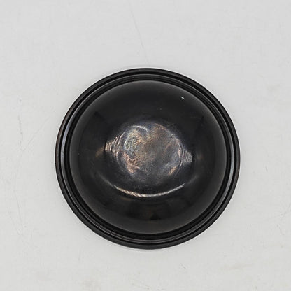 Single molded rubber diaphragm shown from the formed side
