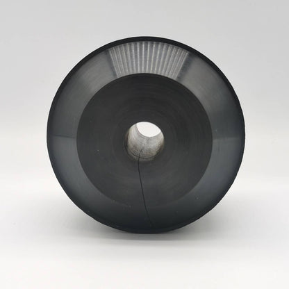 Black oil saver rubber element with a wide flanged profile and center opening