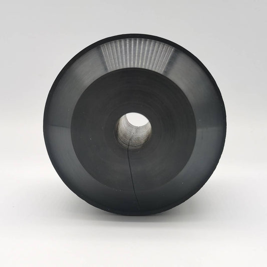 Black oil saver rubber element with a wide flanged profile and center opening