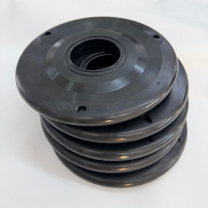 Stack of circular black wiper elements on a white background