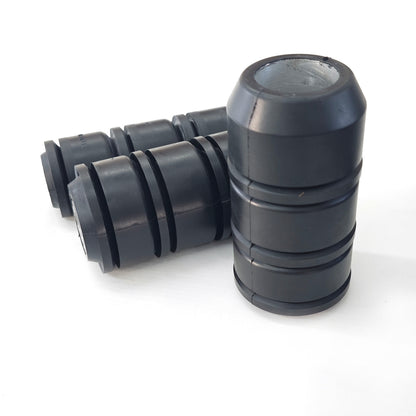 Group of black 3-1/2 inch TA-type tubing swab cups with metal cores
