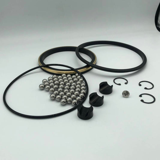 Forum-style swivel joint repair kit components with seal rings and steel balls
