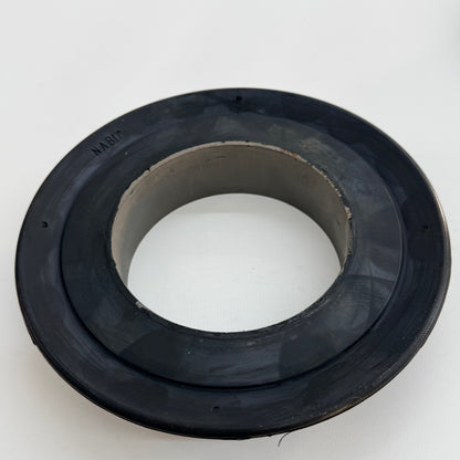 Top detail of a 7 inch V-type tubing swab cup with metal core