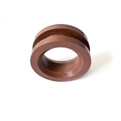 Brown double-flanged rubber grommet with a center opening and grooved outer wall