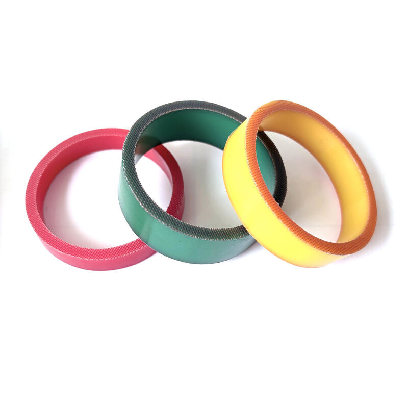 Colored custom molded circular seal rings with textured outer bands