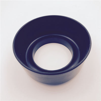 Single black cup-shaped molded rubber component with a central bore