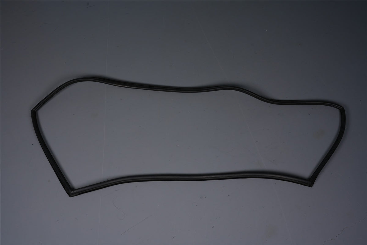 Custom molded rubber perimeter seal with an irregular rectangular profile