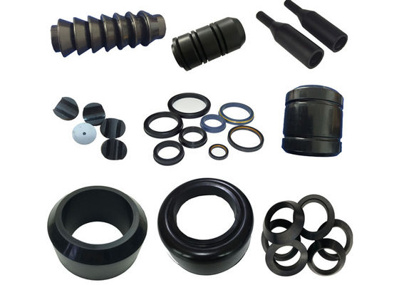 Assortment of black molded rubber components for oilfield equipment