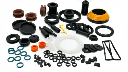Assorted custom molded rubber components in multiple shapes and colors