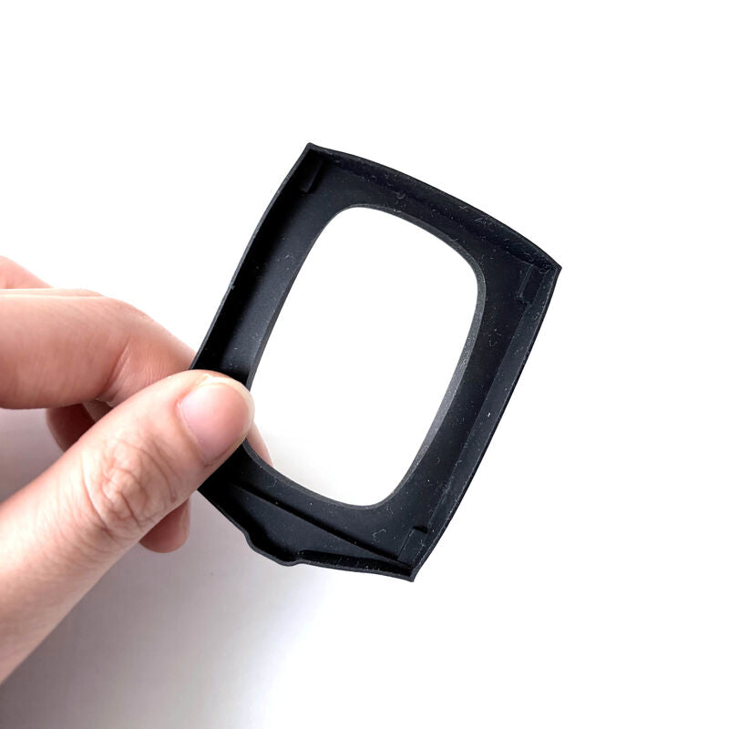 Black custom molded rubber gasket frame with an irregular rectangular opening