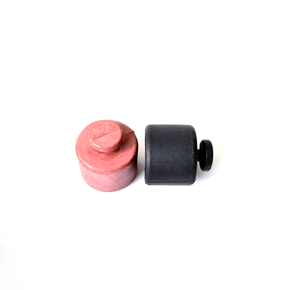 Custom molded rubber plugs with integral pull tabs
