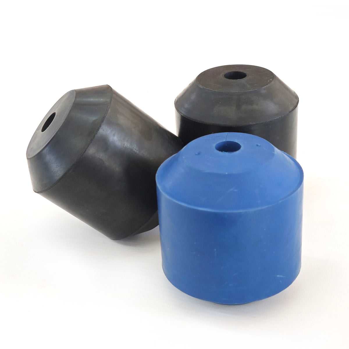 Molded oil-saver rubber elements with central openings and varied tapered profiles
