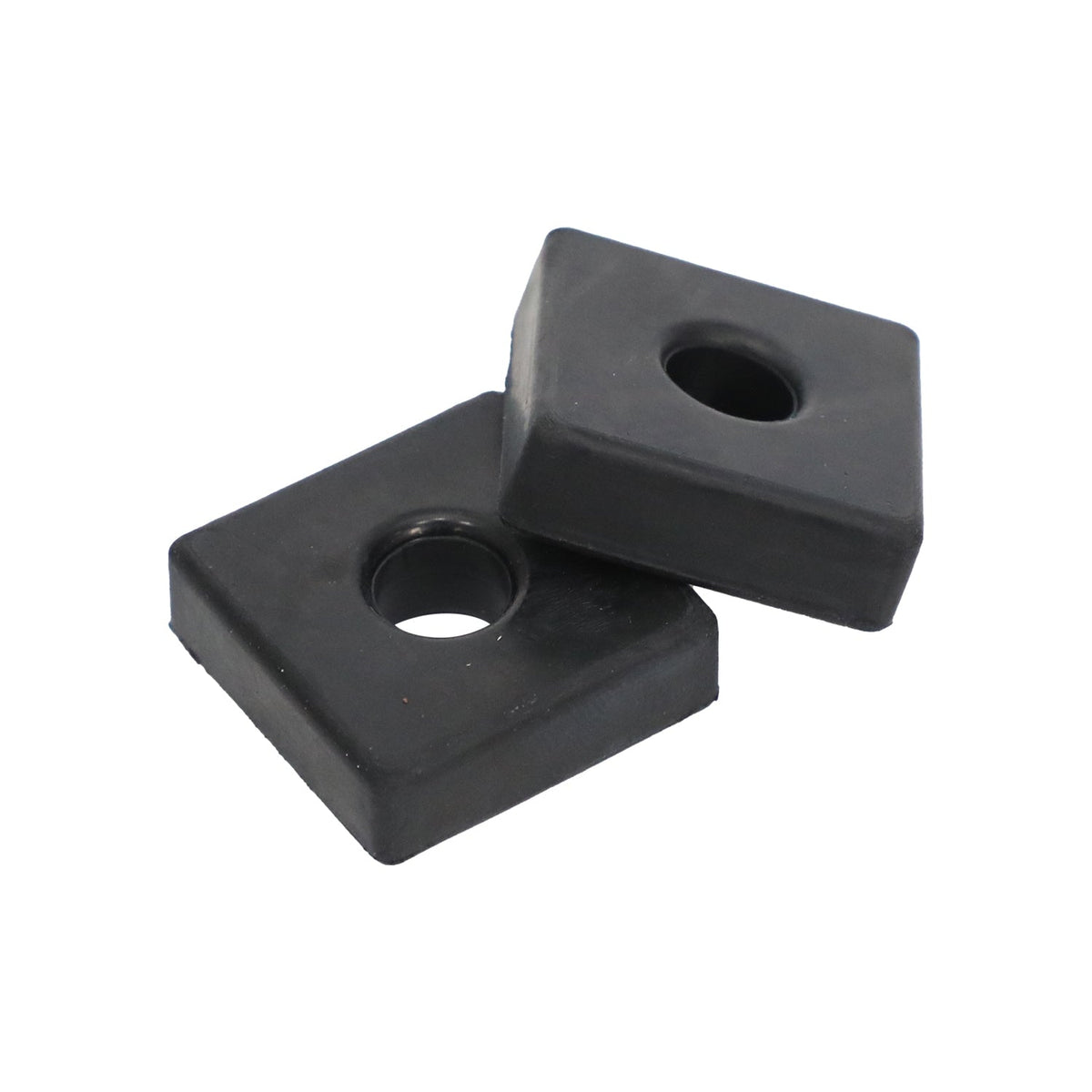 Two black rectangular rubber mounting feet with center holes