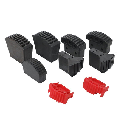Assorted black and red molded feet with ribbed contact surfaces