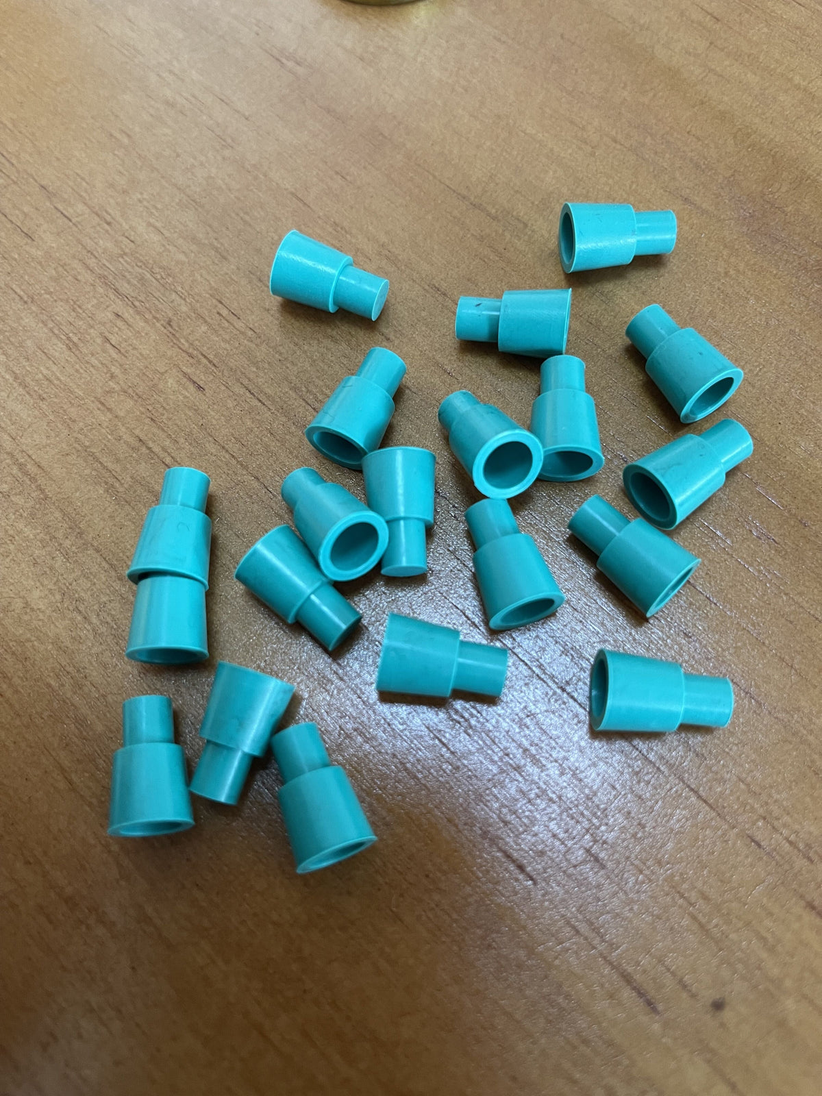 Custom rubber plug examples in stepped hollow profiles