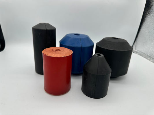 Black, blue and orange cylindrical and tapered molded components