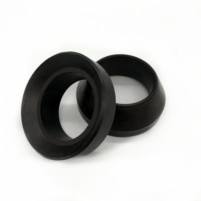 Two black self-sealing packer element profiles showing inner lips and bore openings