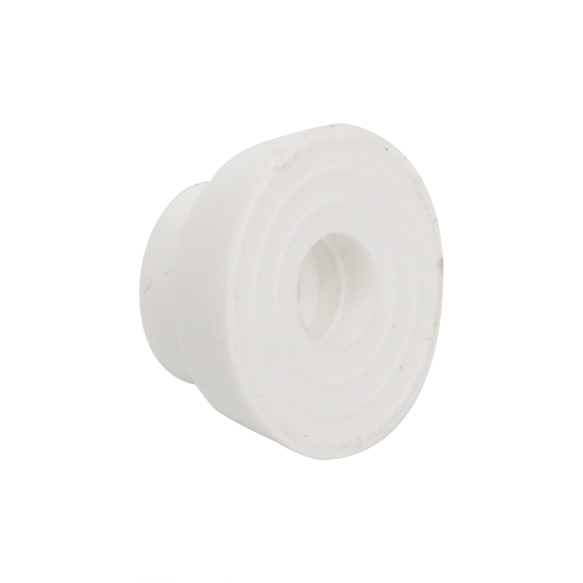 Light-colored circular molded component with a stepped face and central opening