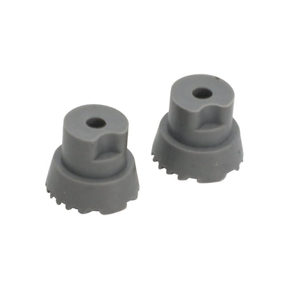Two gray molded stepped rubber stoppers with central bores