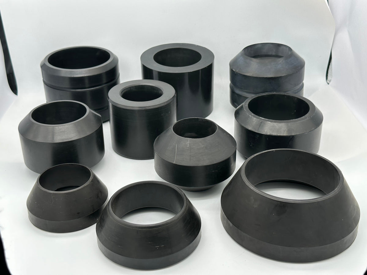 Assortment of black molded rubber packing elements in multiple profiles