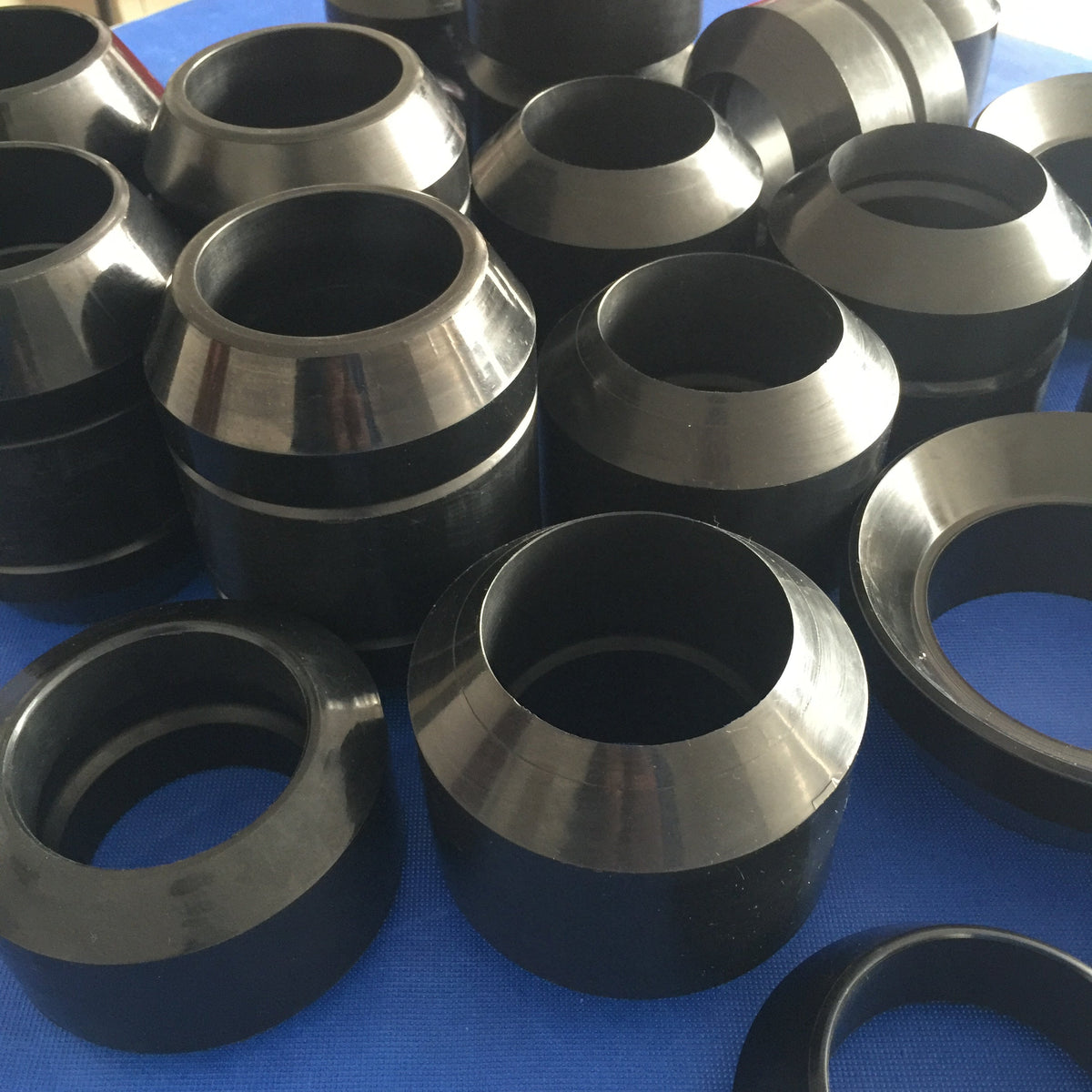 Molded rubber packer cup profile