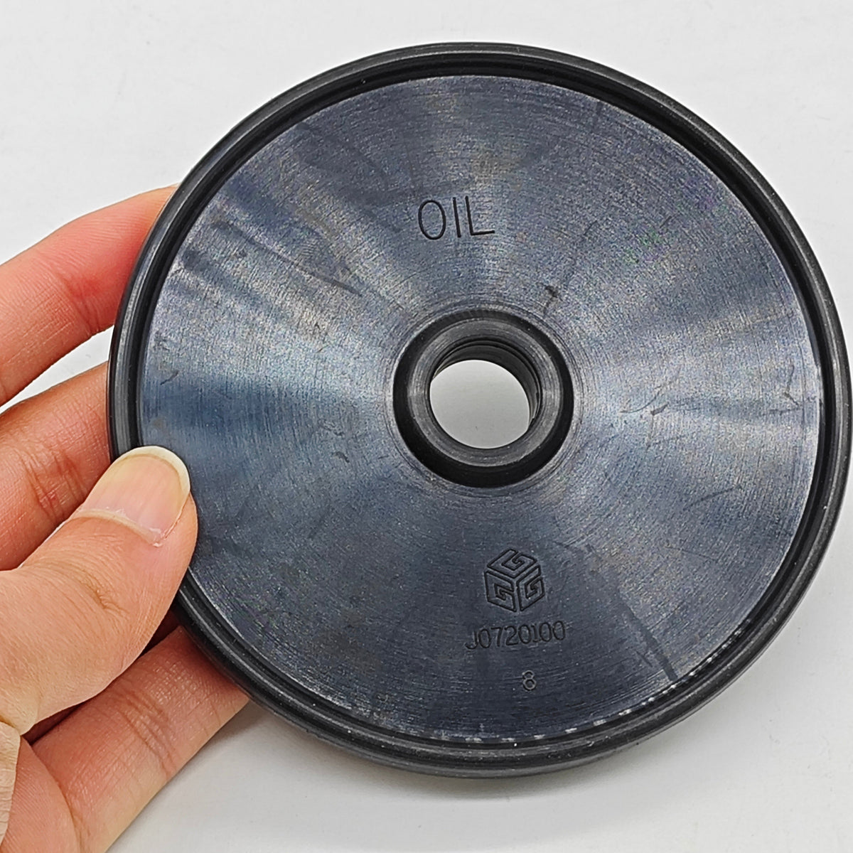 J0720100 pump membrane with molded part marking and center opening