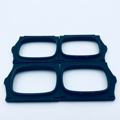 Molded rectangular rubber frame seals with rounded openings and locating features