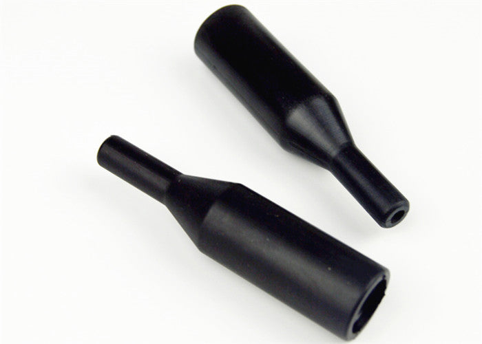 Two black molded rubber cable gland shrouds showing large and small openings