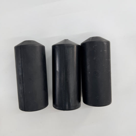 Three black OSB 5/16 in split oil saver rubbers showing split seams and tapered ends