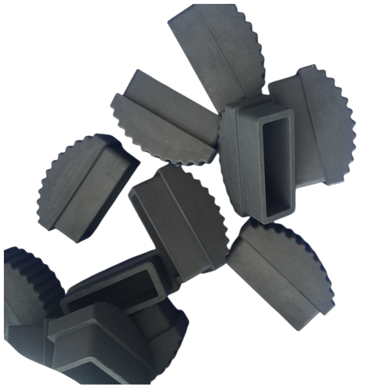 Black molded feet with rectangular openings and ribbed contact edges