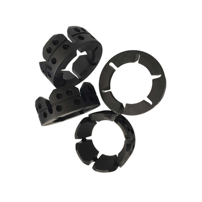 Black split-ring sucker rod guide components with flow-through holes