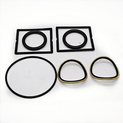 Plug valve seal components arranged on a white background