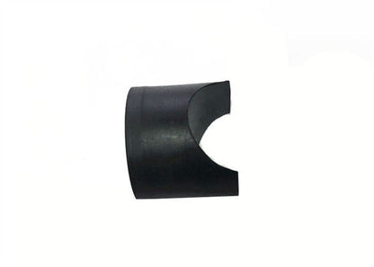 Side detail of a black molded component with a concave cutout