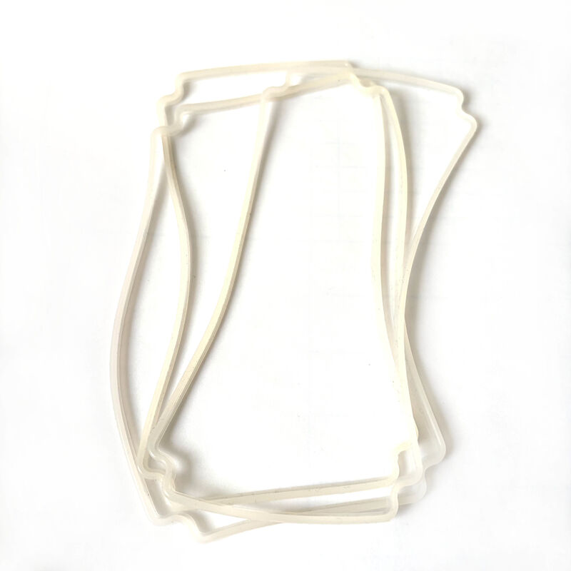 Three translucent molded rubber frame gaskets with contoured rectangular profiles