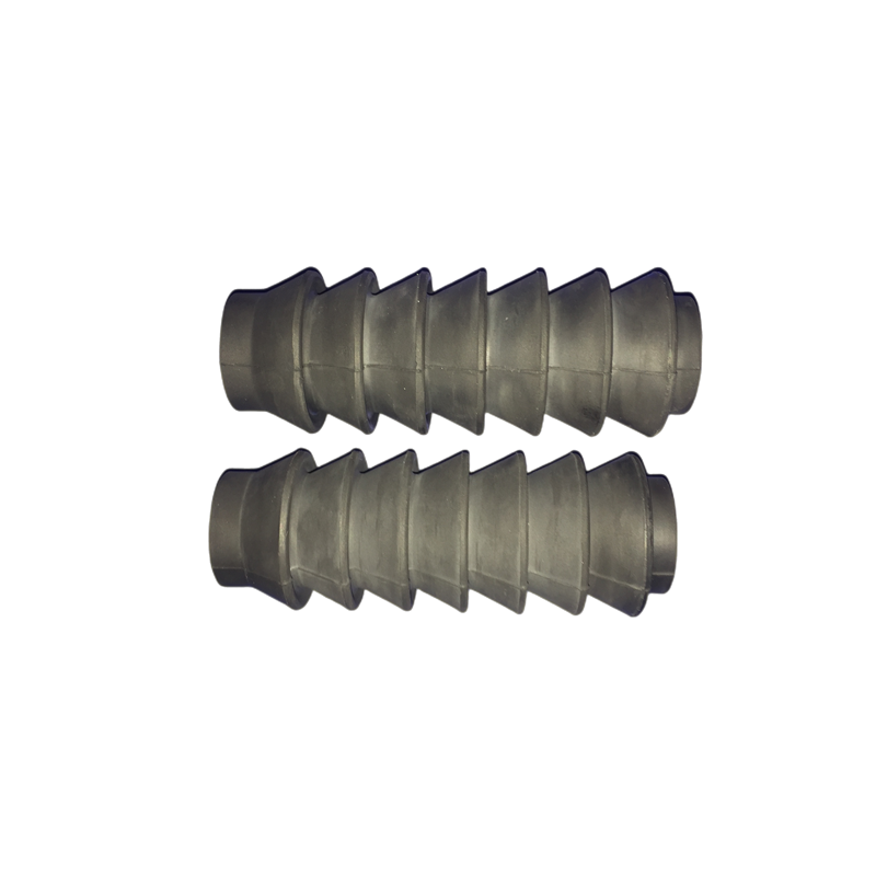 Pair of twist-on sucker rod guides showing external helical ribs and end openings
