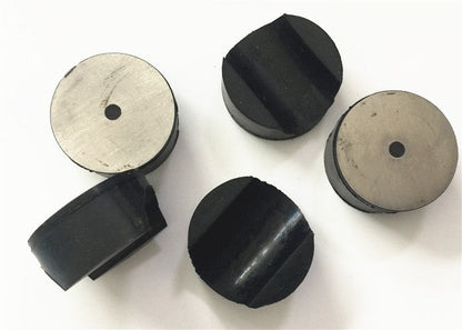Swivel joint rubber ball and retaining plugs