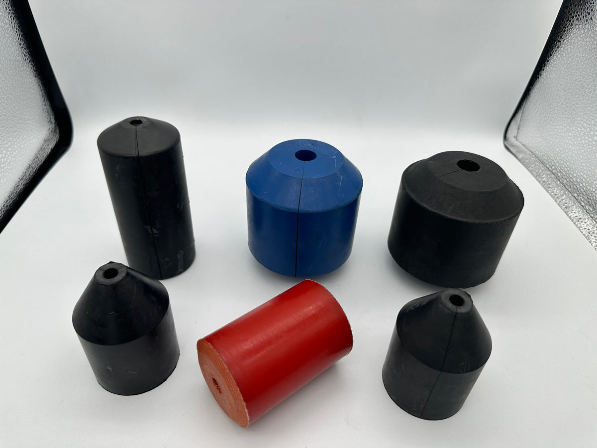 Representative group of molded oil saver rubber profiles including a blue Type H-style element